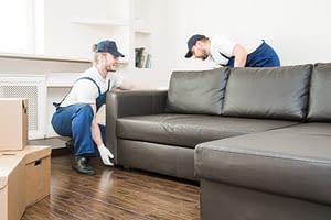 movers moving a couch