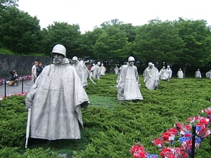 Dershimer Insurance owner Dave Dershimer representing the Memorial Day Foundation by placing flowers at the Korean War Memorial in Washington D.C. in 2013