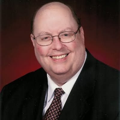 Dean K Wilson