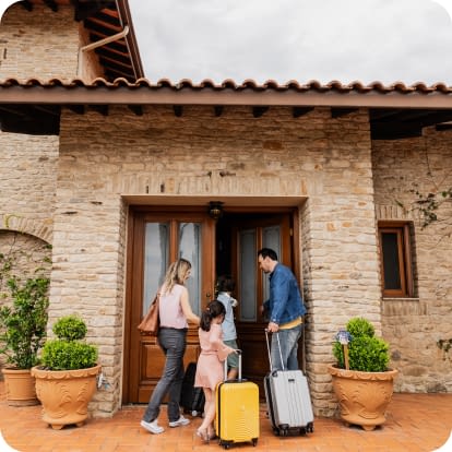 Family arriving at their house