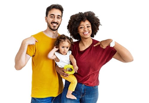 Interracial young family of black mother and hispanic father with daughter smiling amazed and surprised and pointing up with fingers and raised arms.