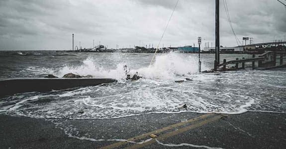 river_cresting_over_a_road_575x300