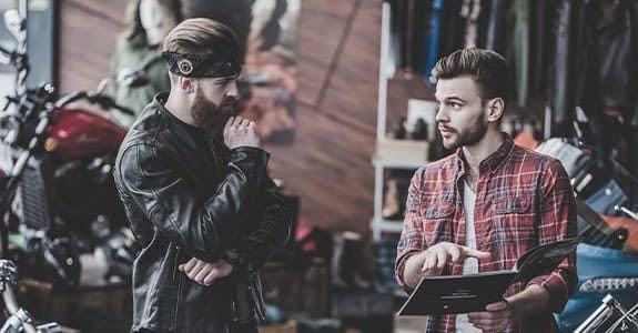 two_guys_talking_575x300