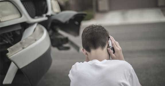 someone_talking_on_phone_575x300