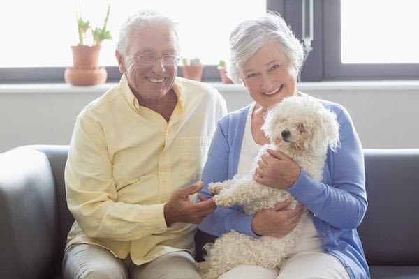 elderly couple dog