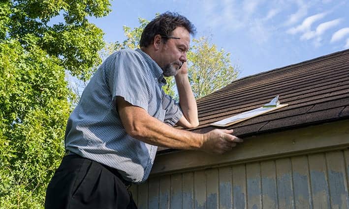 adjuster on roof