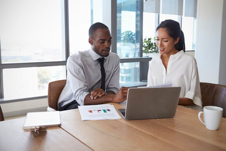 Businesspeople Working On Laptop In Boardroom Together Young Colleagues Working Together In Boardroom