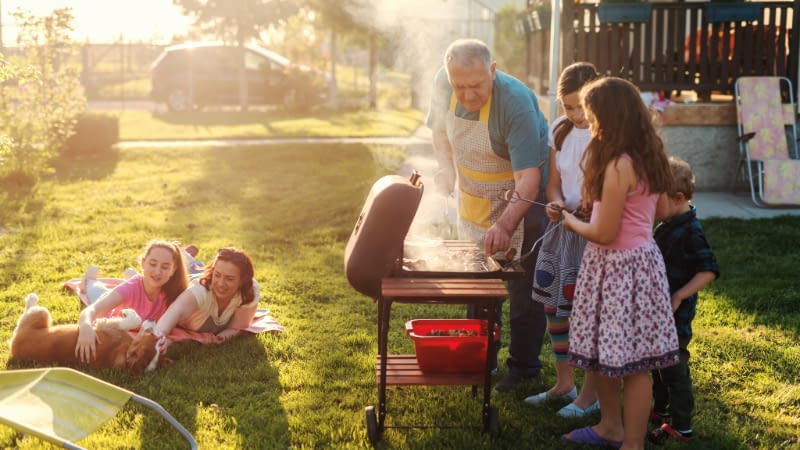 Home Liability Insurance 81826 Family and friends BBQing in the backyard