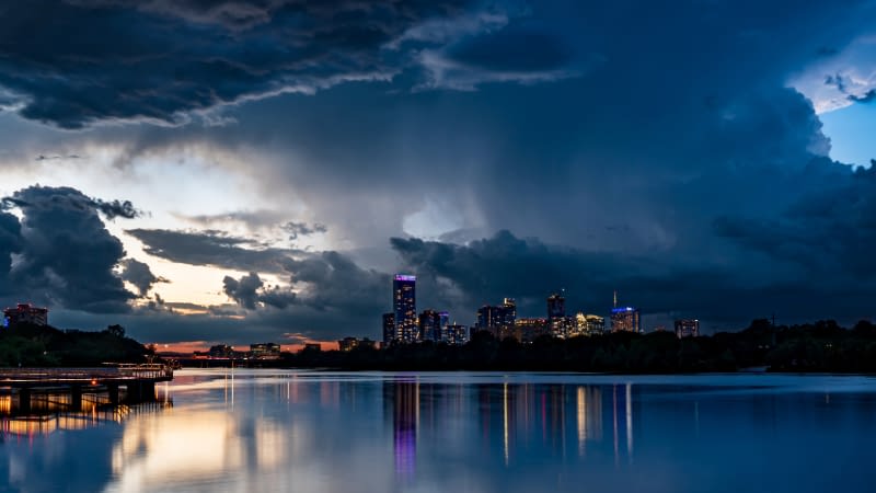 Business Insurance 91026 Stormy skyline over a metropolitan area