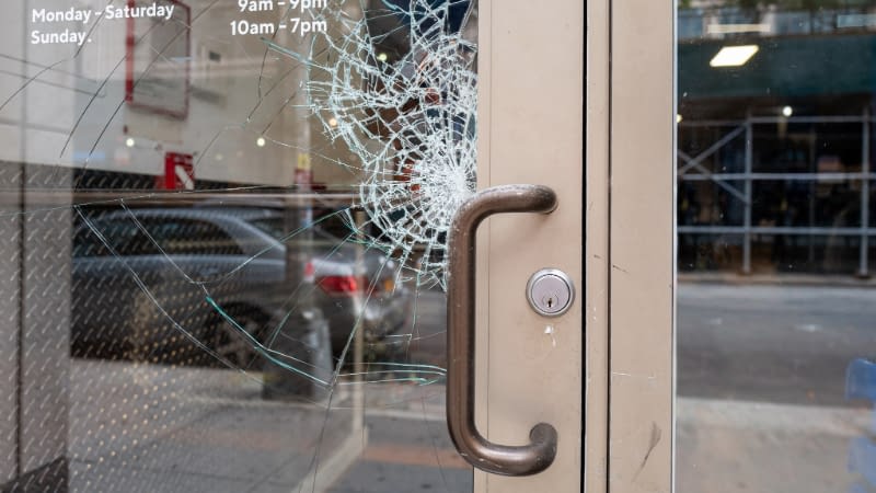 Theft Insurance 10726 Business door with broken glass