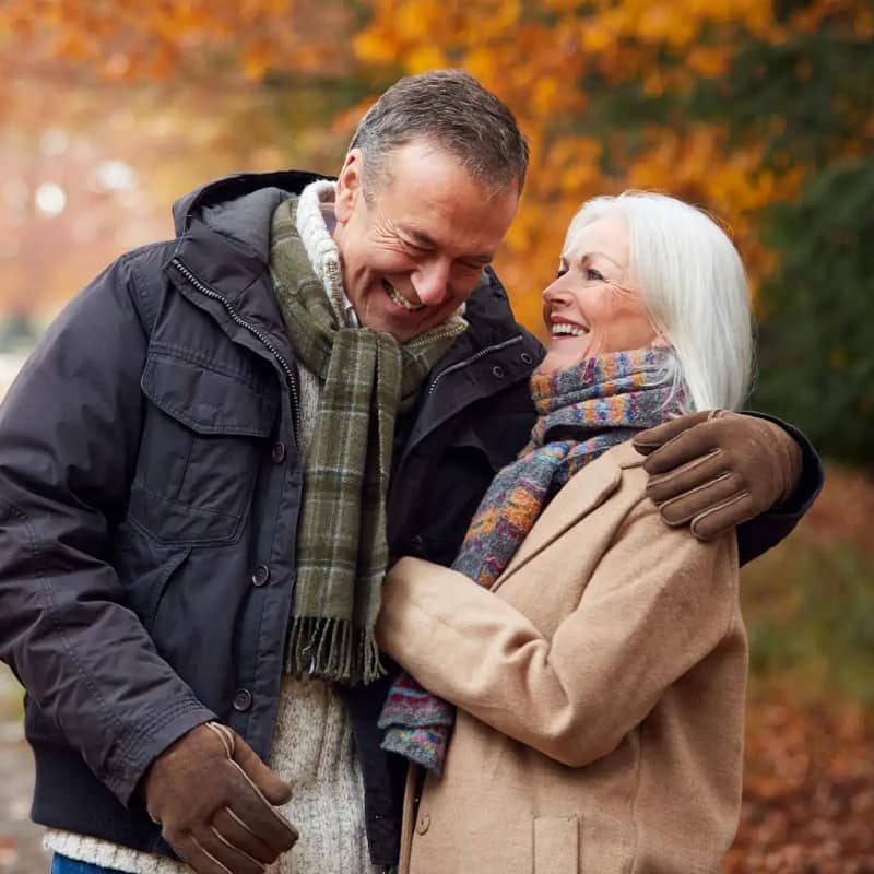 Senior couple on a walk during the fall