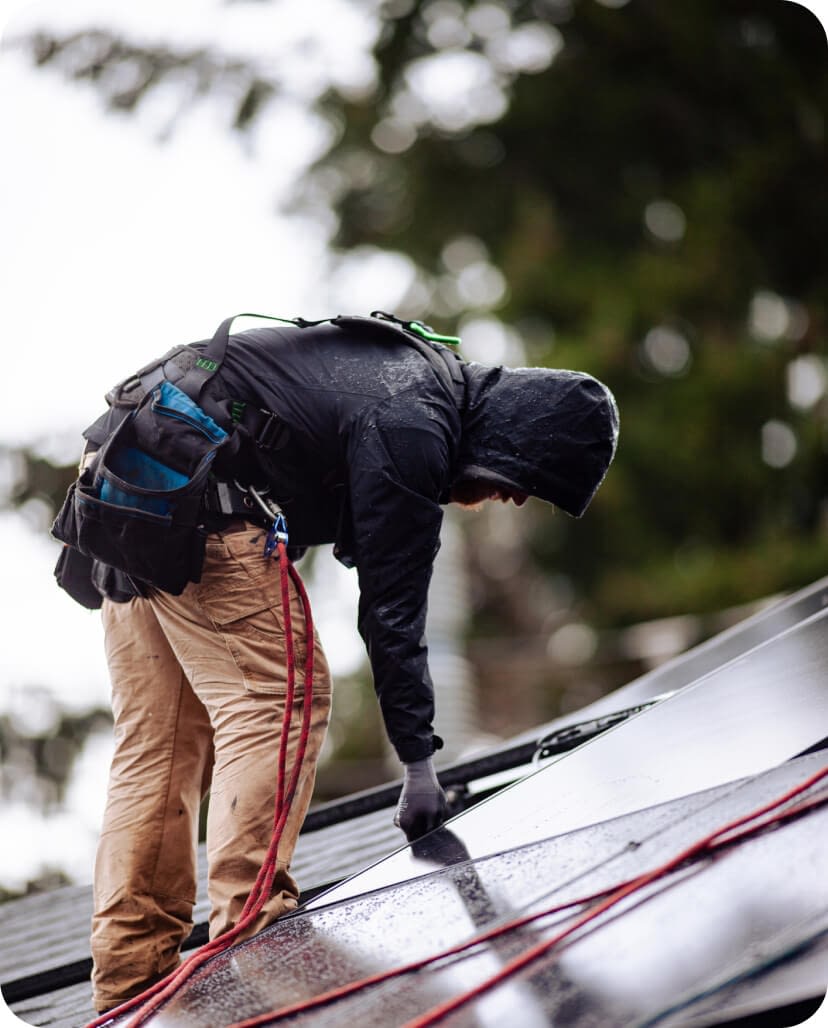 engineers-installing-solar-panels-on-home