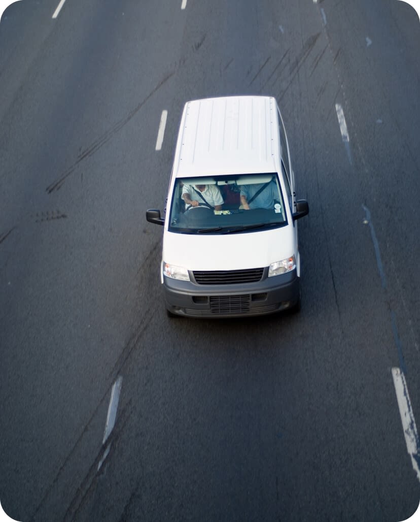 white-light-delivery-truck-on-highway