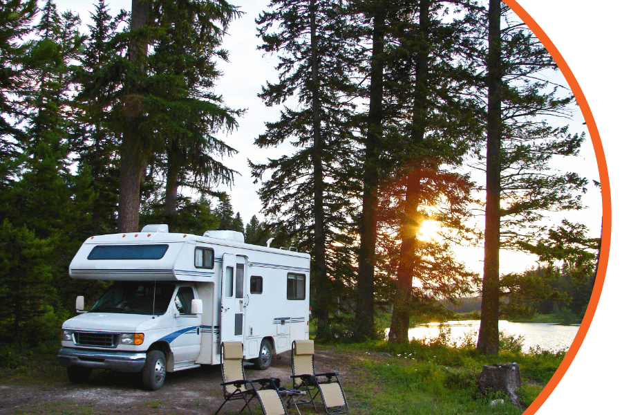 recreational vehicle next to a pond