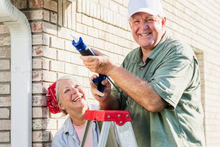 Older Couple Doing Housework