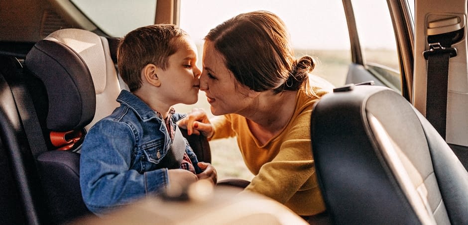 carseat-large-1 Mom Securing Son in Carseat