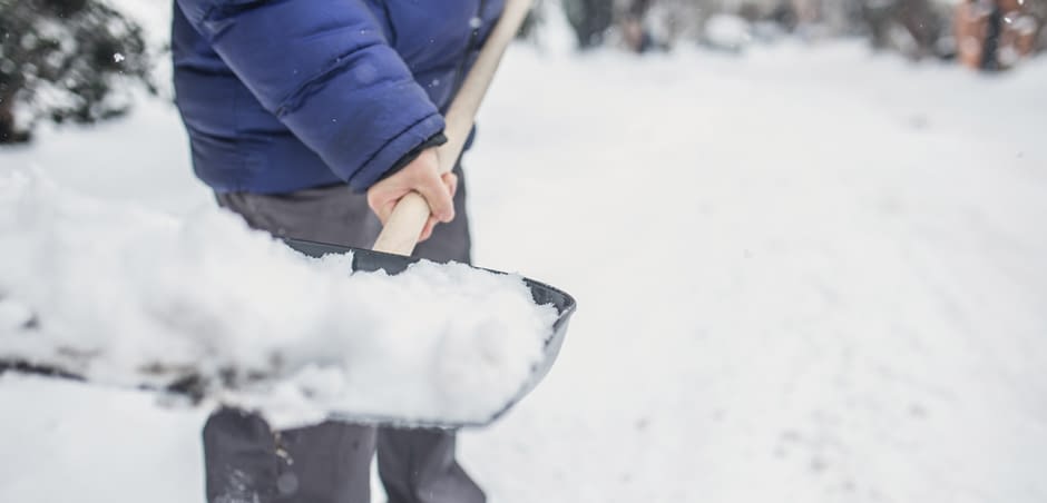 blizzard-large-1 Person Holding a Shovel Full of Snow