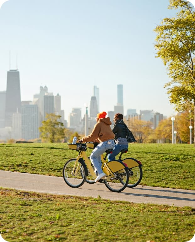 women cycling through chicago