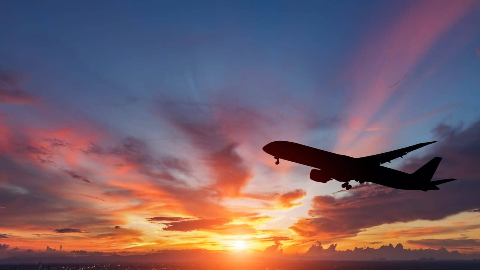 Plane-Takeoff-Travel-Sunset.jpg